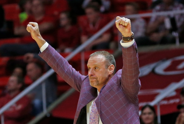 Utah coach Larry Krystkowiak gestures during the first half of the team's NCAA college basketball game against California on Saturday, Feb. 10, 2018, in Salt Lake City. (AP Photo/Rick Bowmer)