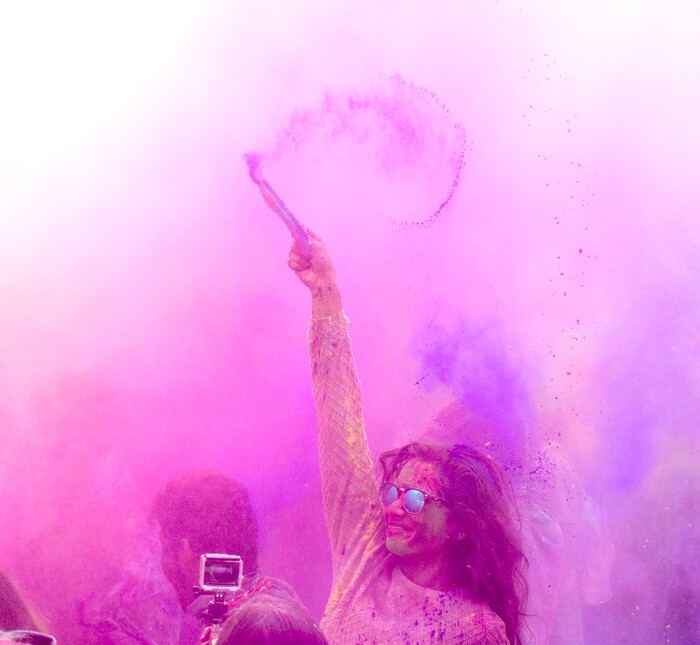 (Rick Egan  |  The Salt Lake Tribune)     Revelers celebrate spring as they toss colored powder into the air, during the 22nd annual Holi Festival of Colors at the Sri Sri Radha Krishna Temple in Spanish Fork, Saturday, March 24, 2018.
