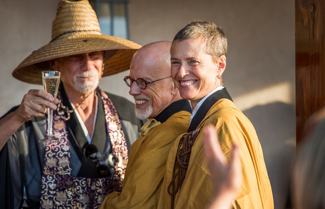 (Leah Hogsten  |  The Salt Lake Tribune) Genpo Merzel Roshi, from left, celebrates with Michael Mugaku Zimmerman Sensei and Diane Musho Hamilton Sensei after the dedication and eye opening ceremony at Torrey Zendo Meditation Center, Sept. 13, 2017, in Torrey. The Torrey Zendo, founded by Zimmerman and Hamilton, is now a year-round facility for Zen study, practice and retreats.