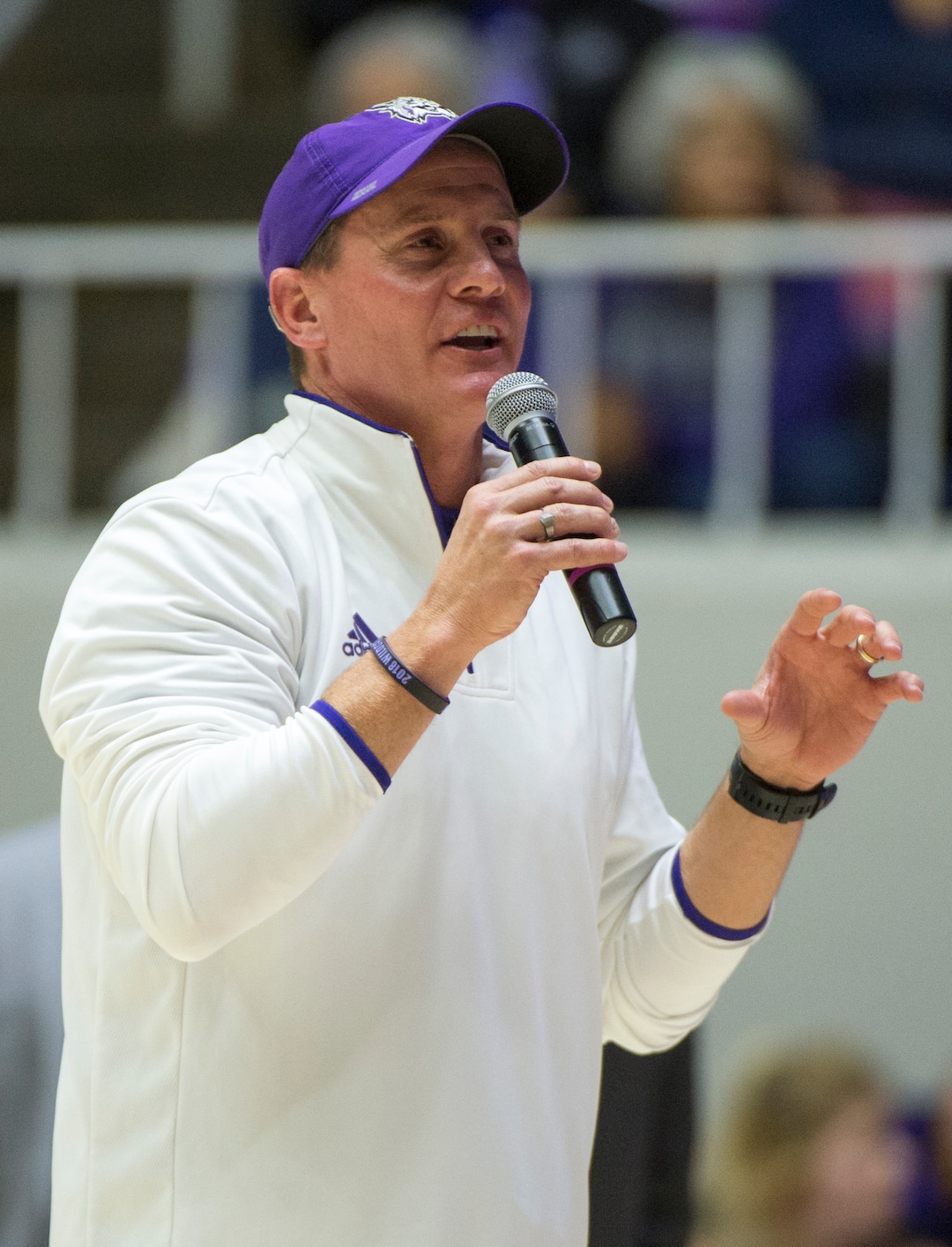 (Rick Egan  |  The Salt Lake Tribune) Weber State Football head coach Jay Hill encourages the crowd to attend the football game next Friday,  during a break in the action between Brigham Young Cougars and Weber State Wildcats, at the Dee Event Center in Ogden, Saturday, Dec. 1, 2018.