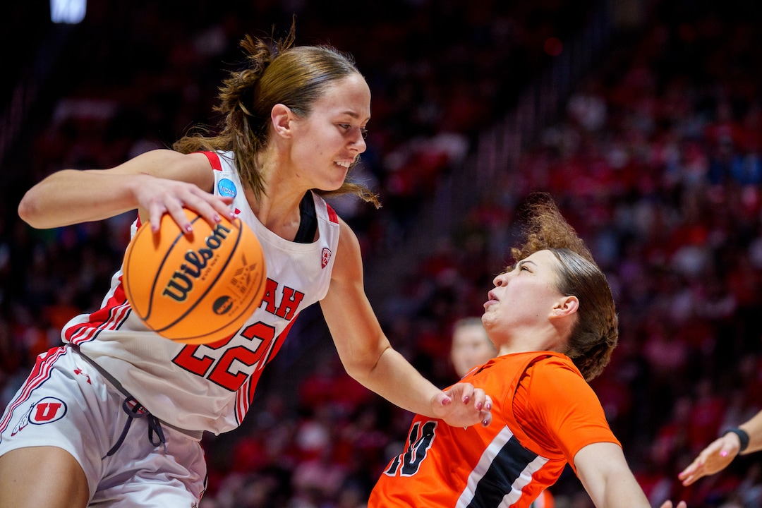 (Trent Nelson  |  The Salt Lake Tribune) Utah Utes forward Jenna Johnson (22) fouls Princeton Tigers guard Grace Stone (10) as Utah hosts Princeton, NCAA basketball in Salt Lake City on Sunday, March 19, 2023.