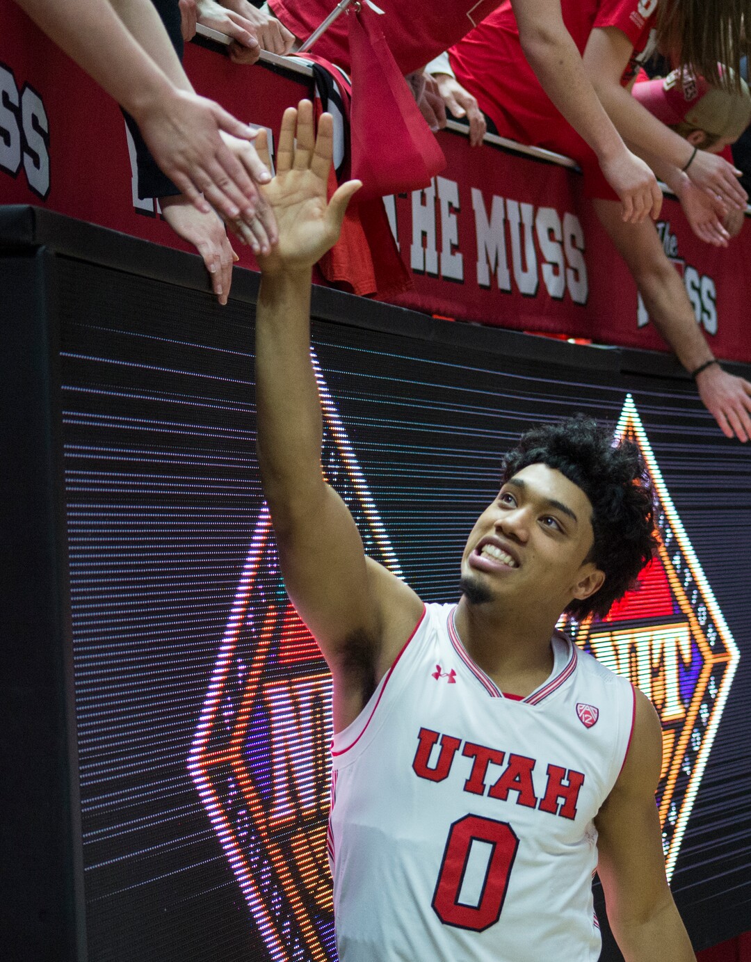 (Rick Egan  |  The Salt Lake Tribune)  Utah Utes guard Sedrick Barefield (0) shakes hands with fans after Utah defeated LSU, in NIT playoff action at the Jon M. Huntsman Center, Monday, March 19, 2018.