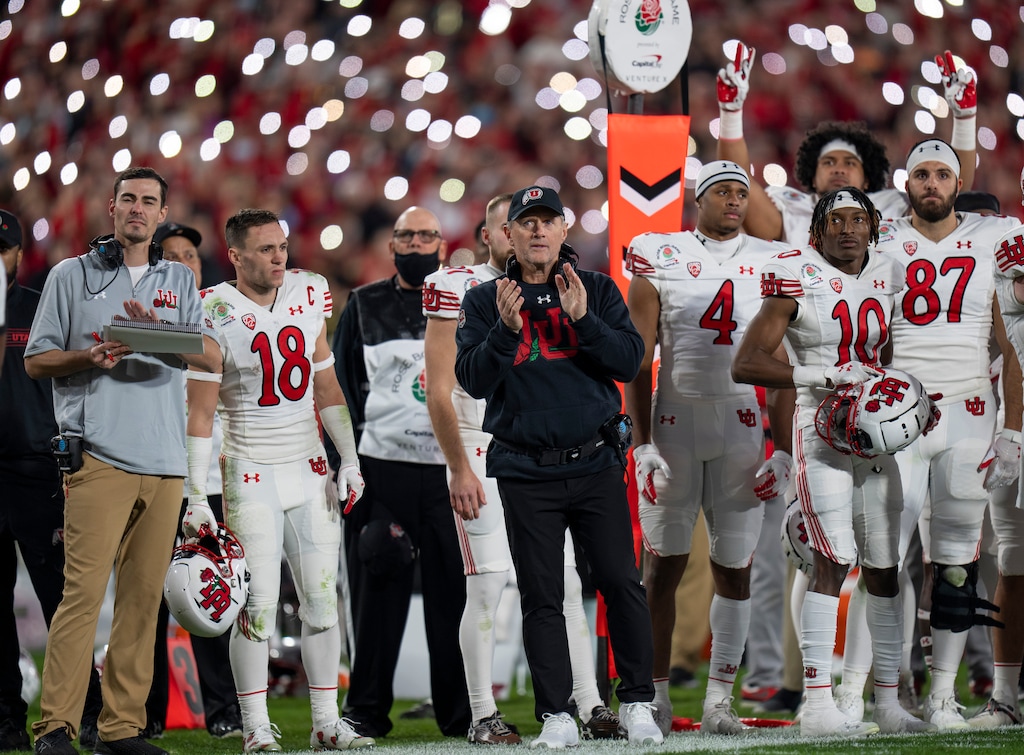 (Rick Egan | The Salt Lake Tribune) Utah Utes head coach Kyle Whittingham and Utah football players salute Aaron Lowe and Ty Jordan during a break in the action, between Utah Utes and Ohio State Buckeyes in the Rose Bowl in Pasadena, Calif., on Saturday, Jan. 1, 2022.