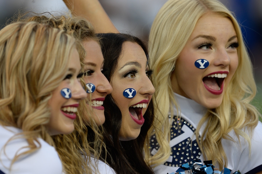 (Francisco Kjolseth  |  The Salt Lake Tribune)  Cougarettes pose for photographs before the start of the BYU vs California game of the NCAA college football game, Saturday, Sept. 8, 2018, at LaVell Edwards stadium in Provo, Utah.