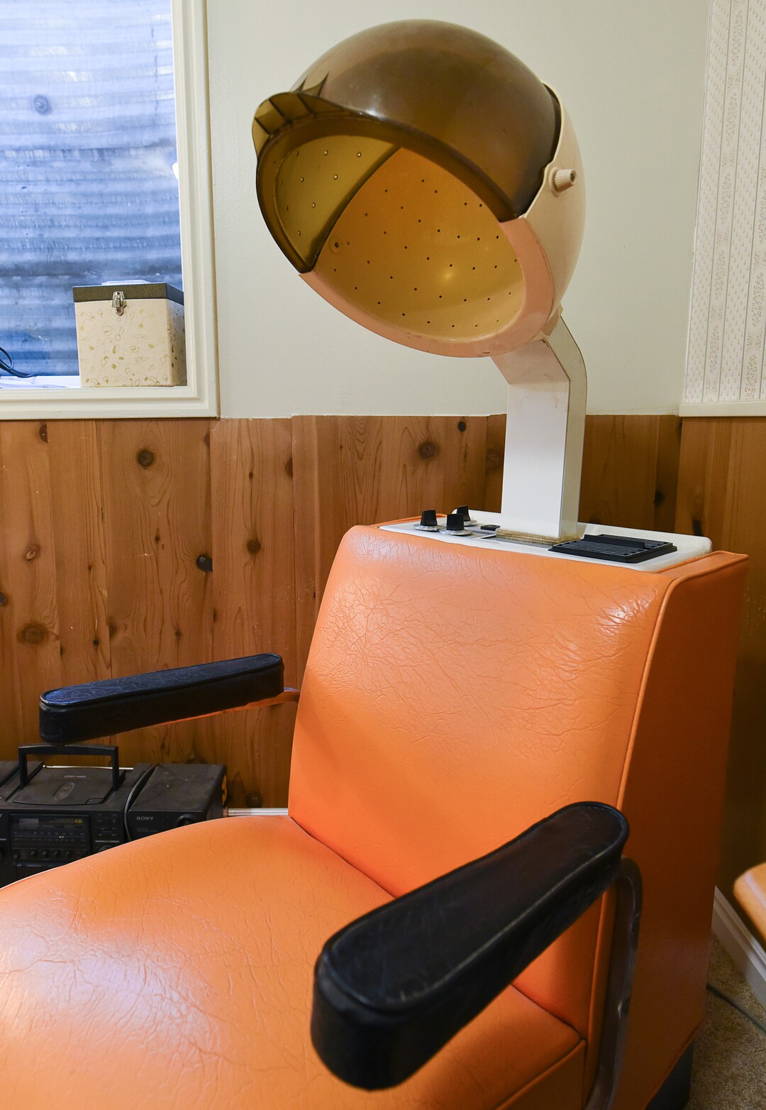 (Francisco Kjolseth  |  The Salt Lake Tribune)  Blair Tomten, who has been using the Kondo method to tidy up her home in Millcreek, holds on to a few items that she holds dear. Included is a hair drying chair that belonged to her grandmother, a beautician who used to run a small business out of her basement back in Wisconsin. 