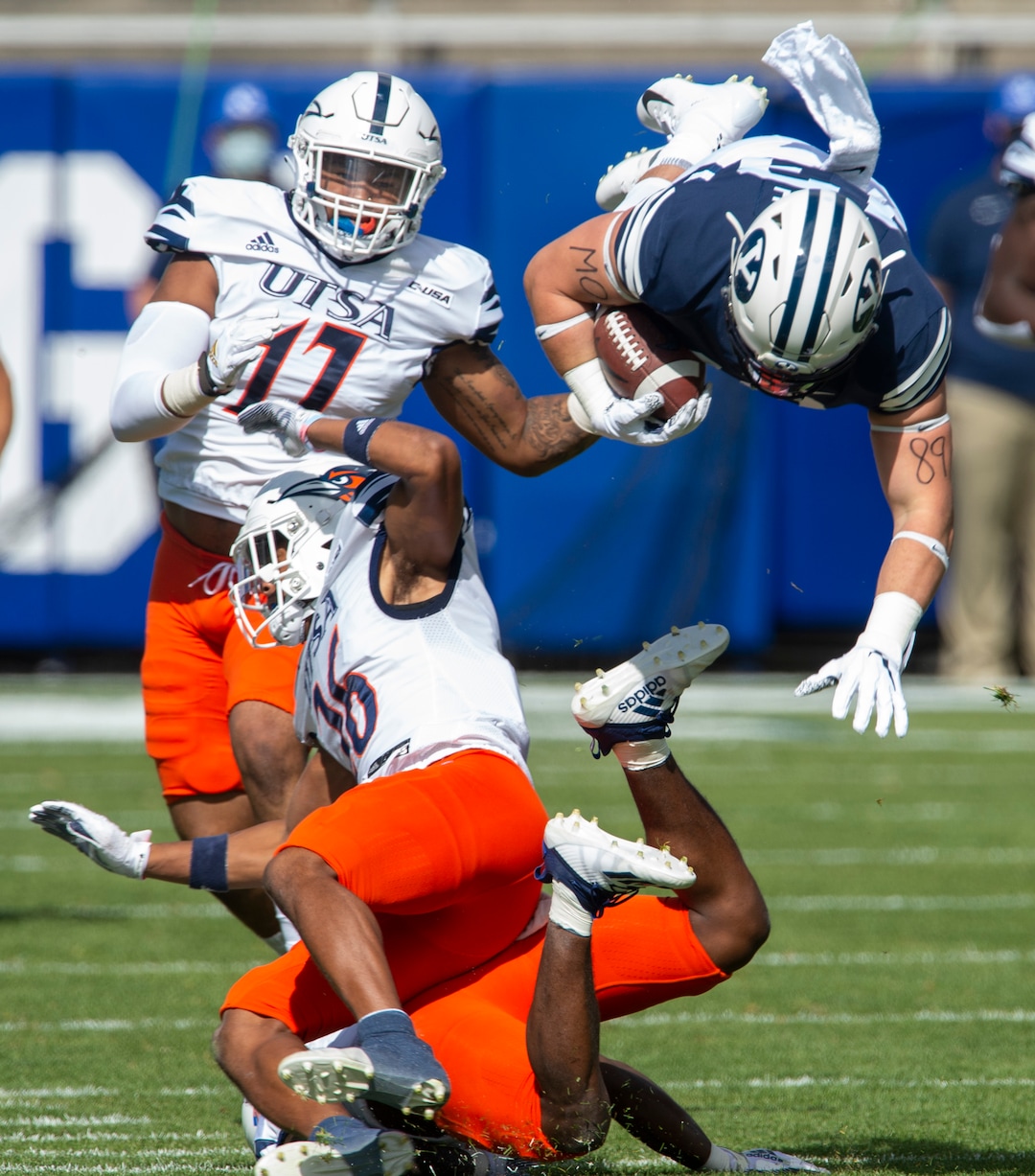 (Rick Egan  |  The Salt Lake Tribune)    Brigham Young Cougars tight end Masen Wake (13) leaps over the top of UTSA Roadrunners cornerback Corey Mayfield Jr. (26) in football action between the Brigham Young Cougars and the UTSA Roadrunners, at Lavell Edwards stadium, Saturday, Oct. 10, 2020.