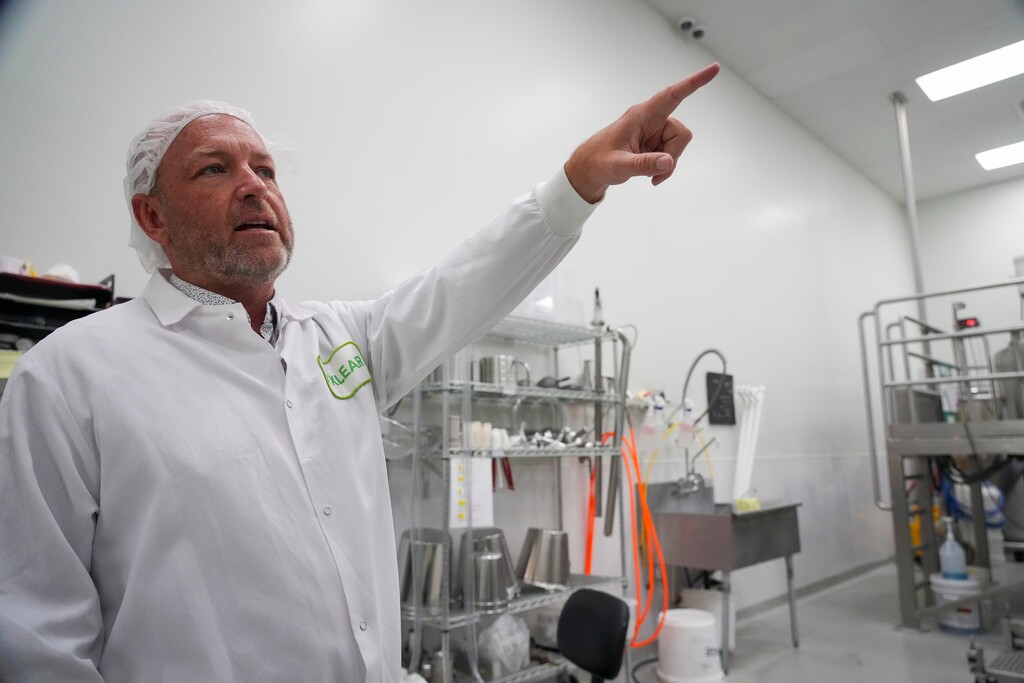(Bethany Baker  |  The Salt Lake Tribune) Xlear President Chad Slaughter points out machinery during a tour of the production line at Xlear, Inc. in American Fork on Wednesday, April 16, 2025.