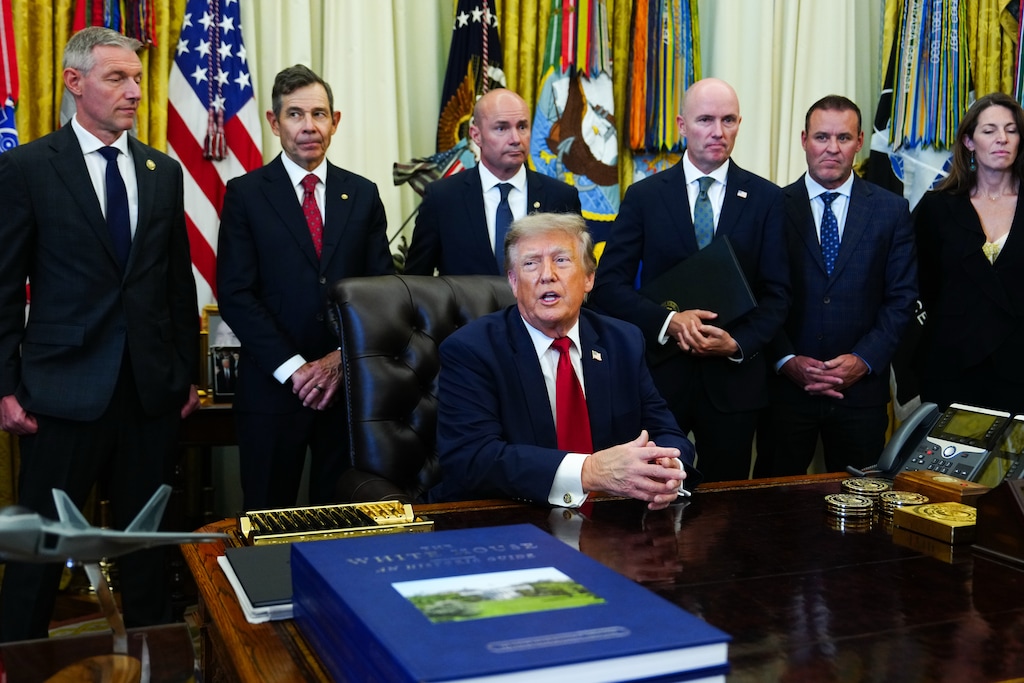 (Julia Demaree Nikhinson | AP) President Donald Trump speaks at the White House, Monday, July 13, 2026, in Washington. Behind Trump, from left: U.S. Rep. Mike Kennedy; U.S. Sens. John Curtis and Mike Lee; Gov. Spencer Cox; House Speaker Mike Schultz, R-Hooper; and Department of the Interior Deputy Secretary Kate MacGregor.