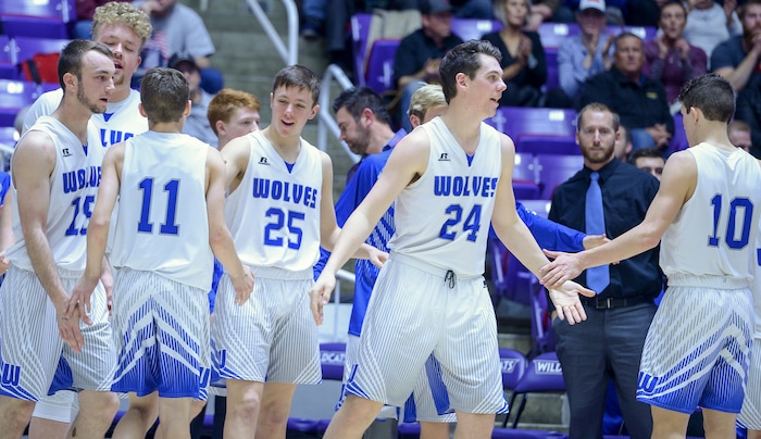 (Leah Hogsten  |  The Salt Lake Tribune)  Fremont celebrates the win. Fremont defeated Hillcrest 62-52 in the 6A High School Boys' Basketball Tournament opening game at Weber State University’s Dee Events Center in Ogden, Tuesday, Feb. 27, 2018. 