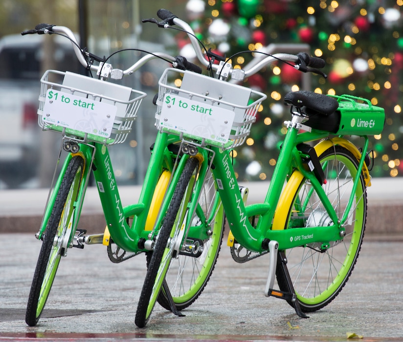 (Rick Egan | The Salt Lake Tribune)  Lime bikes, on Main Street, in Salt Lake,  Tuesday, Nov. 27, 2018.
