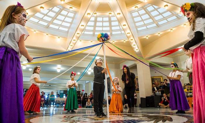 (Leah Hogsten | The Salt Lake Tribune) The Arte Primero dancers perform the Ribbon Dance as part of the Day of the Dead festival Saturday, October 21, 2017 at the Capitol.