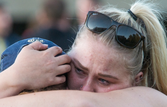 (Rick Egan  |  The Salt Lake Tribune)  Southern Utah University student, Hannah Moyer of Las Vegas (left), gets a hug from Josie Burgess  of Las Vegas, (right) during a candle light vigil for the victims of the Las Vegas shooting, on the SUU campus in Cedar City, Wednesday, October 4, 2017.