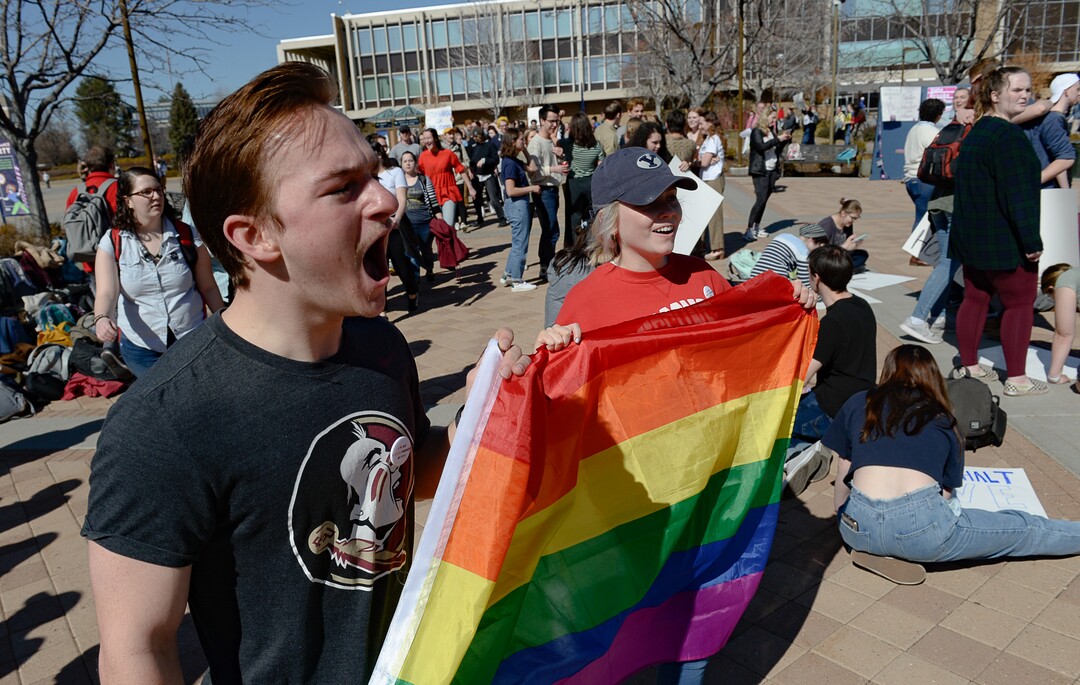 (Francisco Kjolseth  |  The Salt Lake Tribune) Kyle Broderick, left, is joined by Emma Miller as they join the student protest outside the student center at Brigham Young University in Provo, Wednesday, March 4, 2020, after an official with The Church of Jesus Christ of Latter-day Saints issued a clarification to the school's Honor Code, which said that same-sex romantic behavior is still "not compatible" with the rules at BYU.