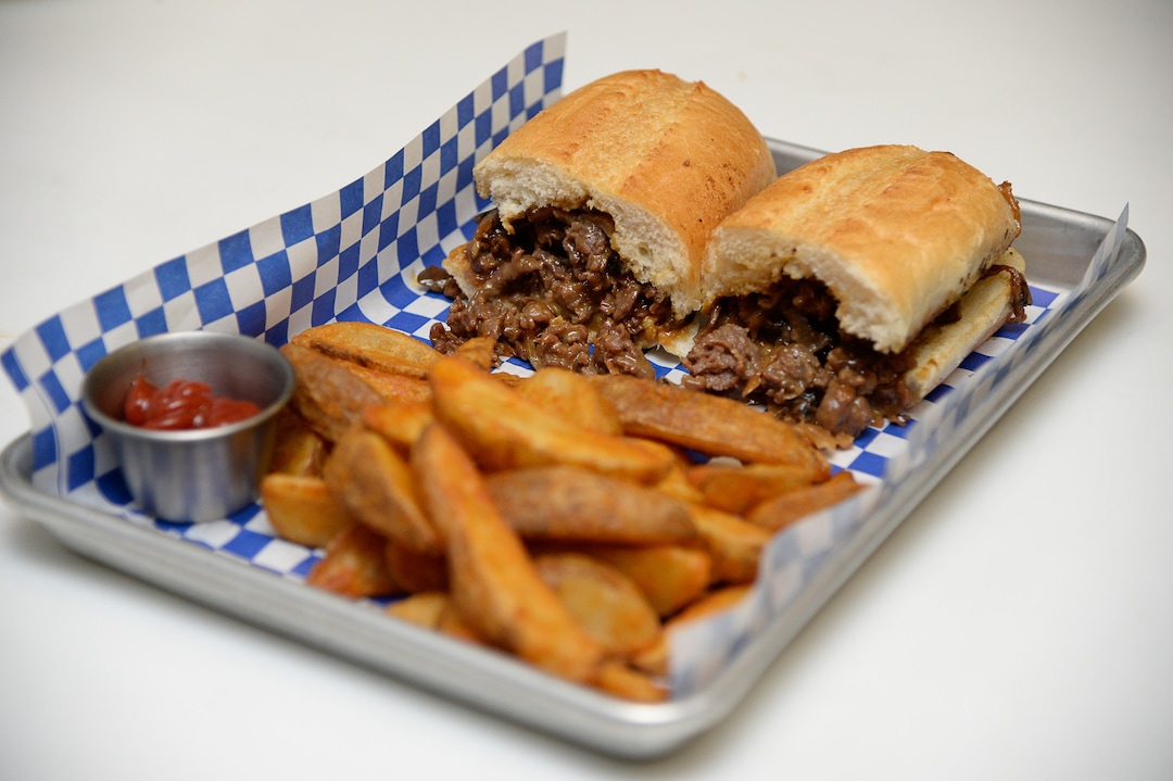 (Francisco Kjolseth  |  The Salt Lake Tribune)  Korean cheesesteak at the Angry Korean fusion restaurant is prepared during the lunch hour on Wed. Sept. 4, 2019. Originally started with a food truck, they now have a sit-down restaurant in South Jordan.