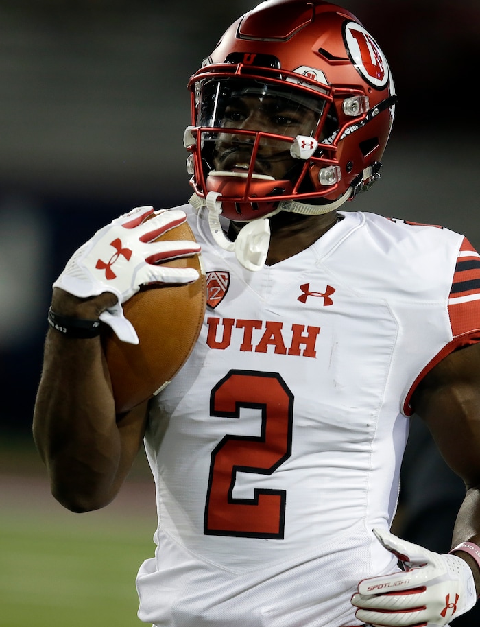 Utah running back Zack Moss (2) in the first half during an NCAA college football game against Arizona, Friday, Sept. 22, 2017, in Tucson, Ariz. (AP Photo/Rick Scuteri)