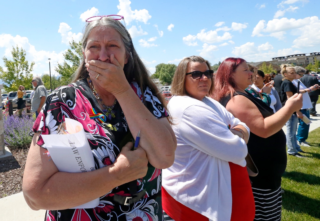 Collette Haines Hatch, left, cries following the service for Elizabeth "Lizzy" Shelley, a 5-year-old girl who police say was taken from her home and killed by her uncle, Tuesday, June 4, 2019, in Logan, Utah. Her uncle, Alex Whipple, is charged with killing her after his sister let him spend the night at the family's home, prosecutors said. Elizabeth "Lizzy" Shelley disappeared May 25 and was found dead less than a block from her home after a five-day search. (AP Photo/Rick Bowmer)