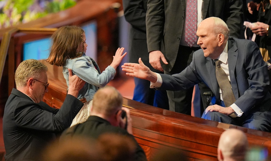 (Chris Samuels | The Salt Lake Tribune) President Russell M. Nelson greets 8-year-old Ella Hadley, from Syracuse, at the conclusion of General Conference of The Church of Jesus Christ of Latter-day Saints in Salt Lake City, Sunday, April 6, 2025.
