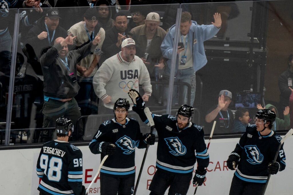 (Rick Egan | The Salt Lake Tribune) Utah Mammoth fans and players celebrate a second-period goal by Utah right wing Dylan Guenther (11) on Feb. 25, 2026.
