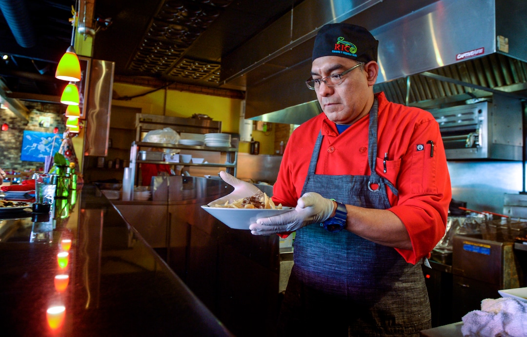 (Leah Hogsten  |  The Salt Lake Tribune) Chef Jose Perez prepares salmon ceviche at Rico Cocina y Tequila Bar, formerly Frida Bistro.