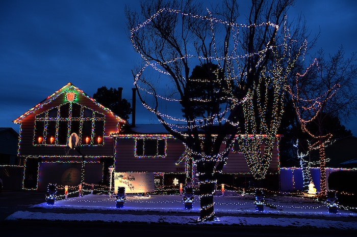 (Scott Sommerdorf | The Salt Lake Tribune)
A view of some of the houses on Royalwood Drive in Taylorsville, Friday, December 22, 2017. "Christmas Street" is a Taylorsville neighborhood where residents up and down the street decorate their homes every year with Christmas lights. The United States uses more electricity for Christmas lights than some countries use all year.