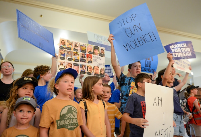 (Chris Samuels | The Salt Lake Tribune) Children stand in front of a rally for increased gun safety measures at the Capitol in Salt Lake City, Saturday, June 11, 2022.