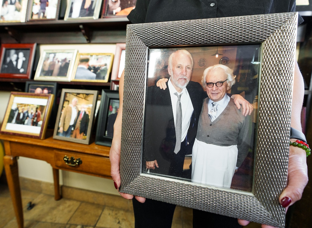 (Leah Hogsten | The Salt Lake Tribune) A photograph of San Antonio Spurs head coach Gregg Popovich and Valter Nassi taken 4 years ago is one of many photos of Nassi with celebrities and NBA players on display at the entrance to Valter's Osteria, Oct. 10, 2022. Nassi, the big-hearted Salt Lake City restaurateur who served fine Italian food for more than two decades, died Sept. 20th.