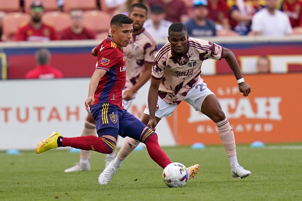 (Rick Bowmer | AP) Portland Timbers' Juan Mosquera (29) guards Real Salt Lake forward Jefferson Savarino, left, during the first half of an MLS soccer match Sunday, Oct. 9, 2022, in Sandy.