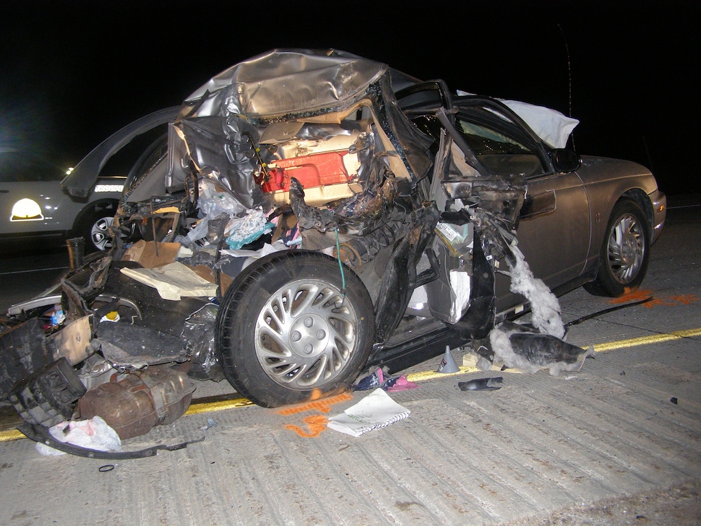 (Courtesy Utah Department of Public Safety)  Semi truck driver Nathaniel R. Bone, 37, of Midvale, was allegedly shopping online with his phone when he rear-ended this passenger car on May 27, 2017, near Park City. The driver of the car, Sandra Bowden, 40, of West Jordan, was seriously injured. Bowden's  passenger, Landon Peatross, 41, of Duchesne, was killed. Bone was charged with second-degree felony "text messaging or email automobile homicide." Bone also was charged with texting or emailing while driving, a class B misdemeanor.