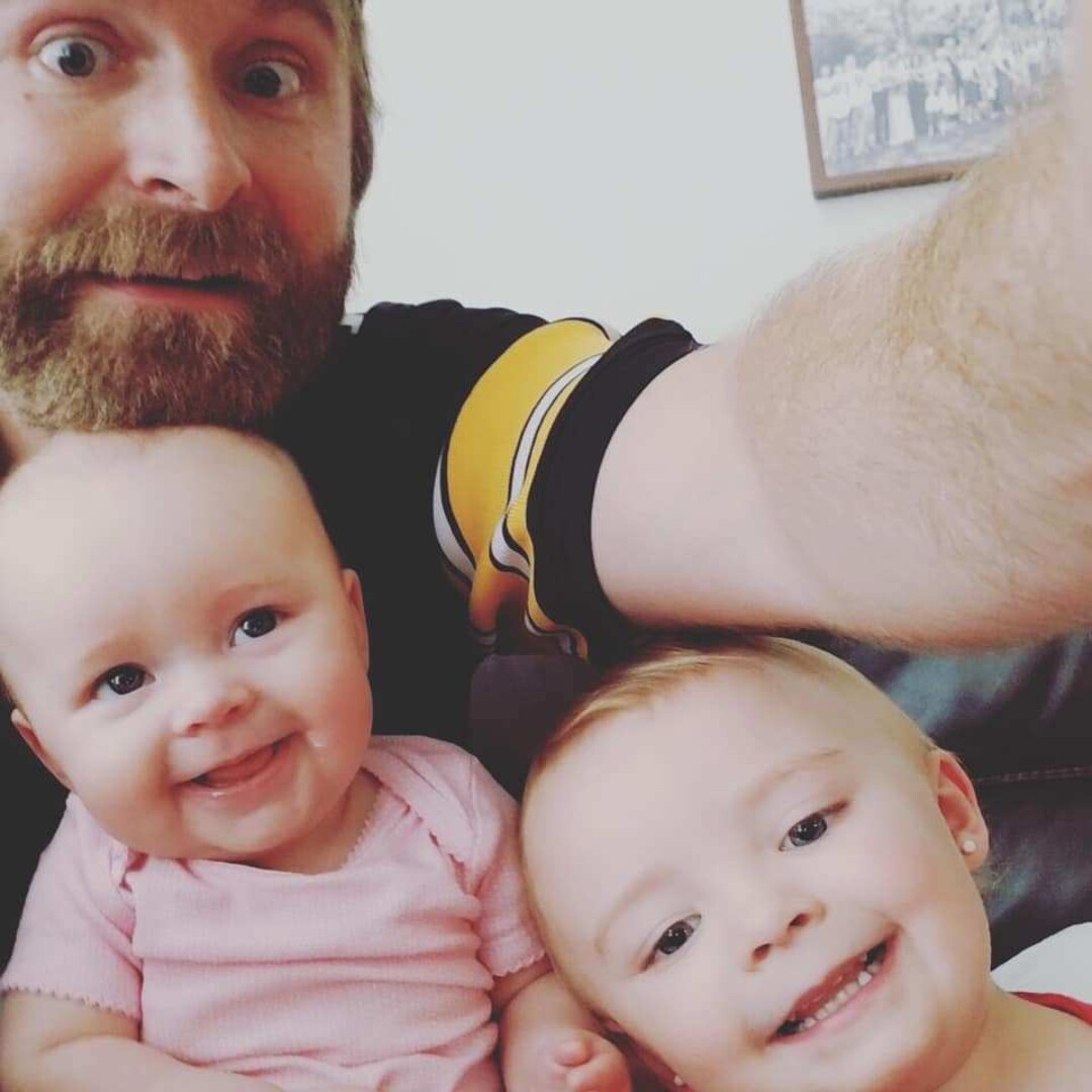 (Photo courtesy of Dani Bates) Denny Bates in an undated photo with his daughters Piper, left, and Winnie.