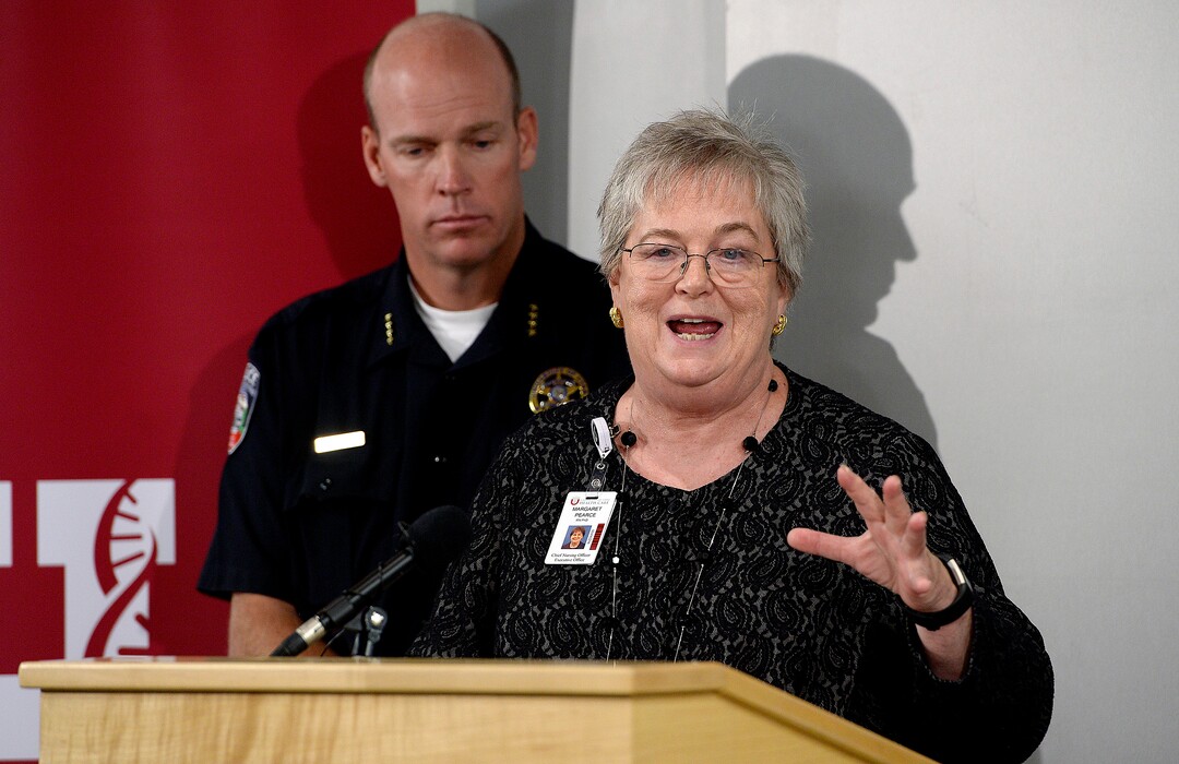 (Scott Sommerdorf   |  The Salt Lake Tribune)   Margaret Pearce, Chief of Nursing, speaks at a press conference held at the Uniuversity of Utah Medical Center regarding arrest of nurse Alex Wubbels, who refused to draw bloodMonday, September 4, 2017. Behind Pearce is Dale Brophy, University Chief of Police, and director of public safety.