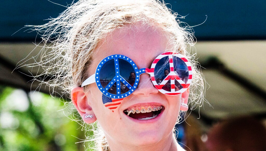 (Rick Egan | The Salt Lake Tribune) Lyla Leonhardt, 11, enjoys the Layton Liberty Days parade on Monday, July 5, 2021.