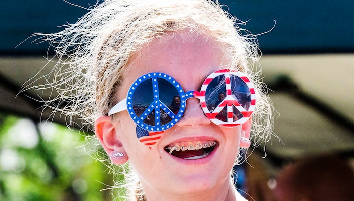 (Rick Egan | The Salt Lake Tribune) Lyla Leonhardt 11, enjoys the Layton Liberty Days parade, on Monday, July 5, 2021.