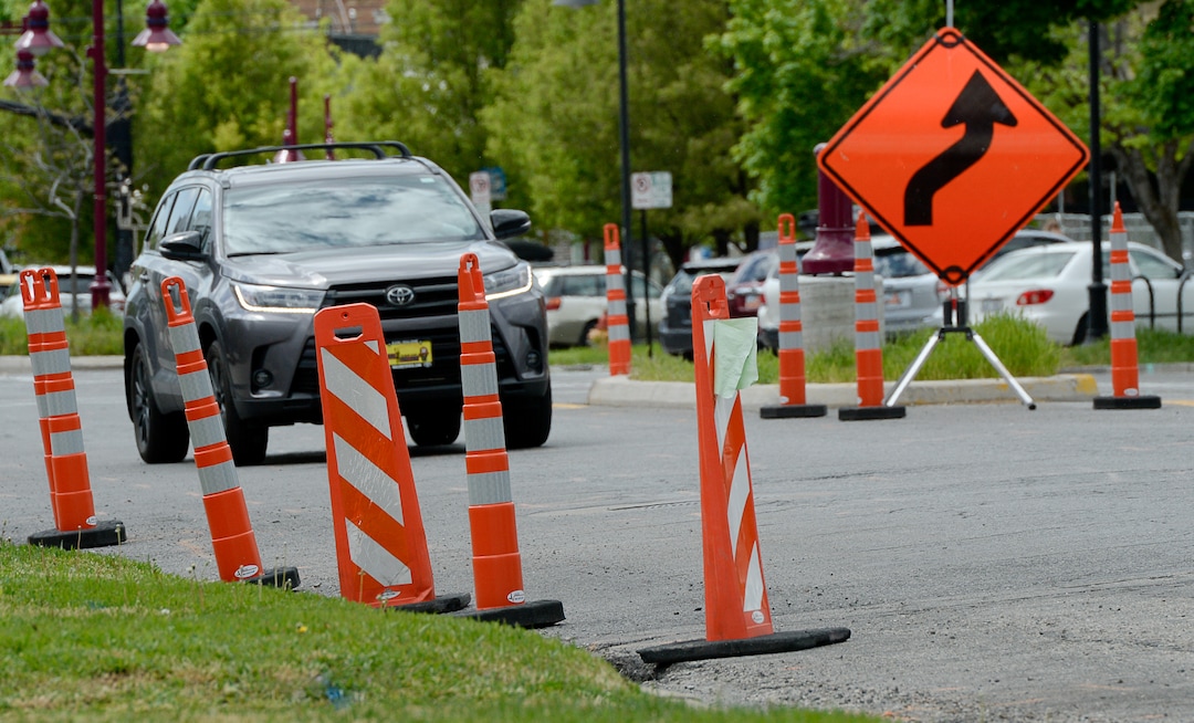 (Francisco Kjolseth  |  The Salt Lake Tribune)  Traffic moves along a sea of orange as plans to repurpose 29 parking spaces between 950 East and 1300 East on 900 South in Salt Lake City causes some frustration from business owners and residents in the area.