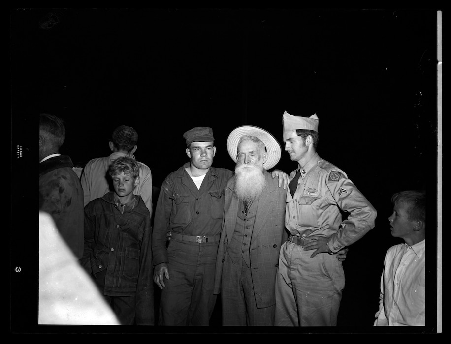 | courtesy of the Utah Historical Society
Men and boys are gathered in a photo dated July 26, 1953, during the state of Arizona's raid on the Short Creek polygamous community. The photo is part of a collection recently made available from Salt Lake Tribune negatives digitized by the Utah Historical Society.