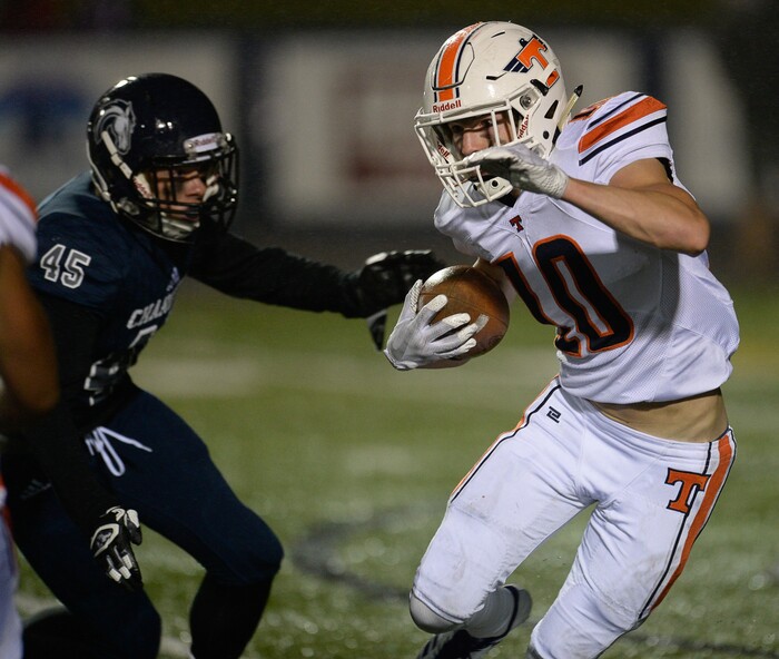(Francisco Kjolseth  |  The Salt Lake Tribune)  Payton Madsen faces the Corner Canyon defense during game action between Timpview at Corner Canyon on Thursday, Sept. 21, 2017.