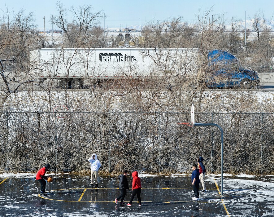 (Francisco Kjolseth  |  The Salt Lake Tribune)  

Students at North Star Elementary have recess adjacent to I-215 on, Feb. 11, 2019.