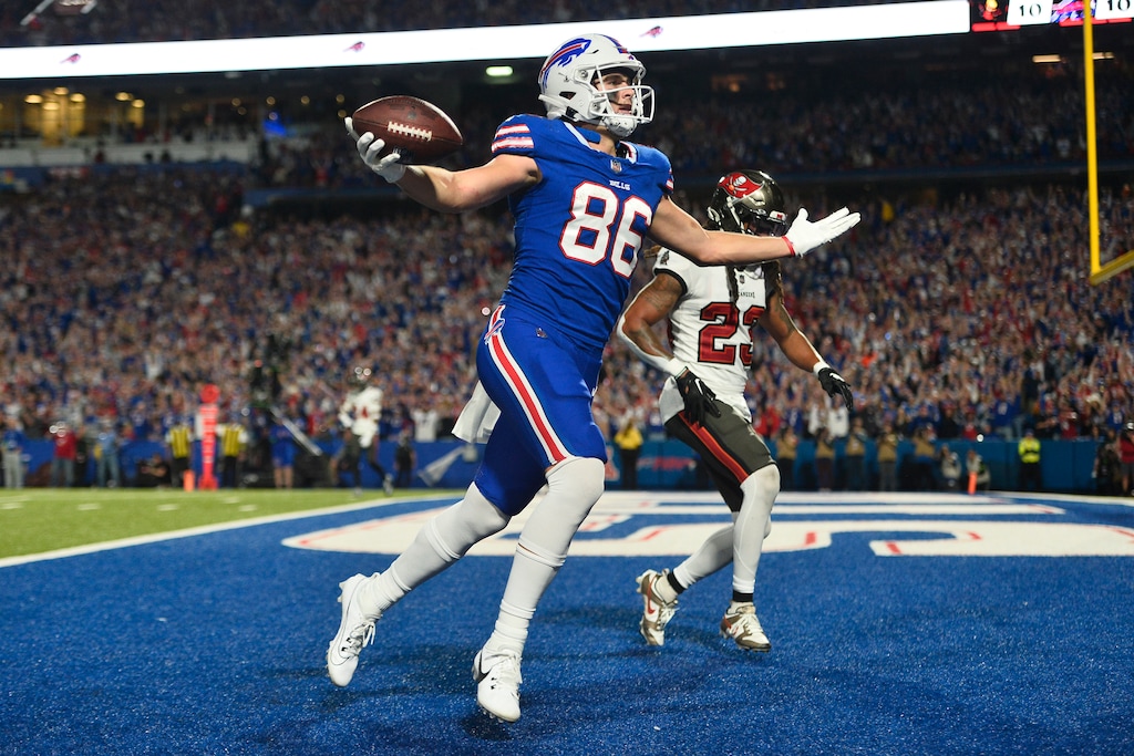 (Adrian Kraus | AP) Buffalo Bills tight end Dalton Kincaid (86) gestures after scoring in front of Tampa Bay Buccaneers safety Ryan Neal, right, in the first half Thursday.