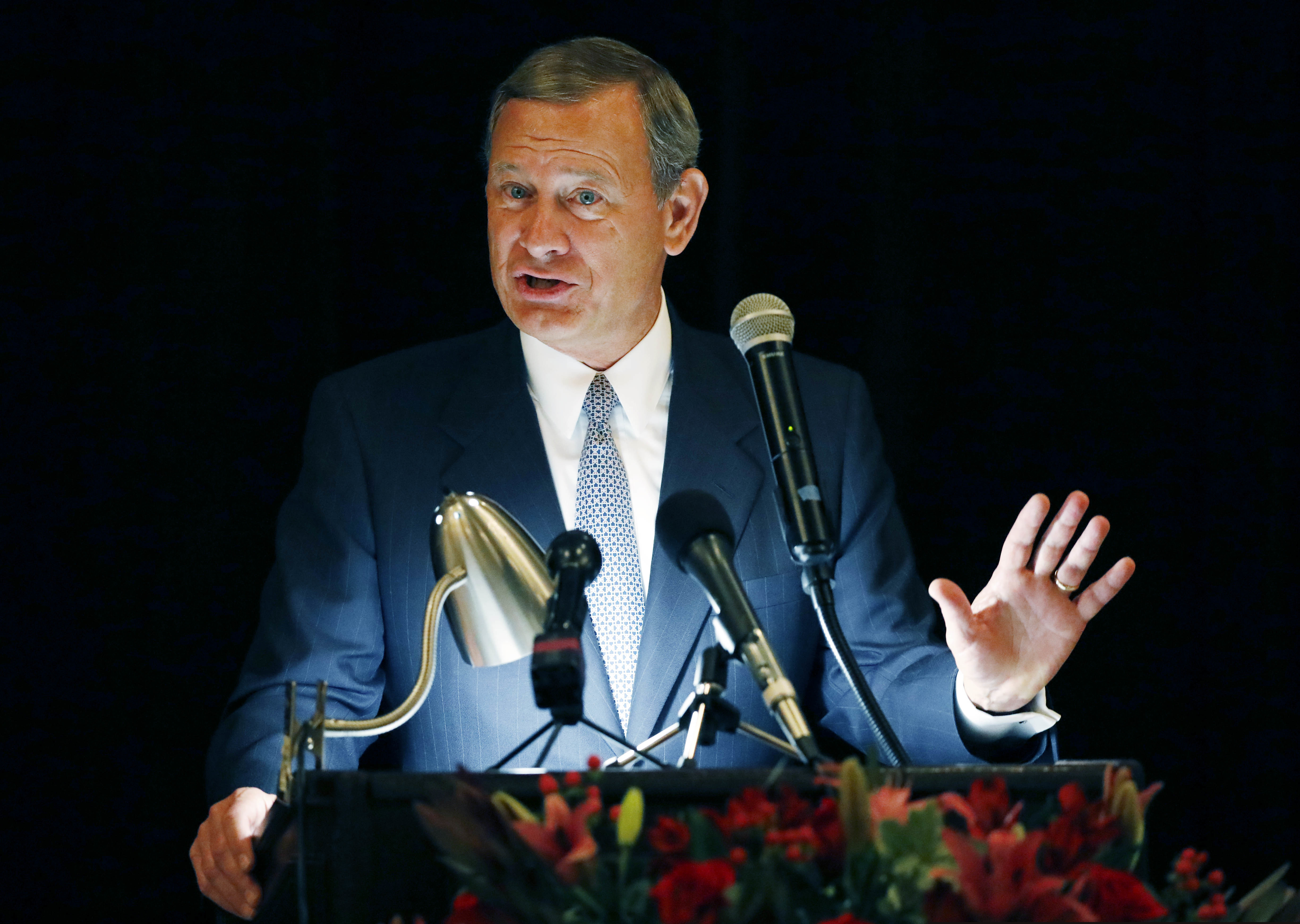 (AP Photo/Rogelio V. Solis) In this Sept. 27, 2017 file photo, Chief Justice John Roberts speaks during the Bicentennial of Mississippi's Judiciary and Legal Profession Banquet in Jackson, Miss. Roberts is pushing back against President Donald Trump’s description of a judge who ruled against the administration’s new asylum policy as an “Obama judge.” It’s the first time that the leader of the federal judiciary has offered even a hint of criticism of Trump, who has previously blasted federal judges who ruled against him.  Roberts says Wednesday that the U.S. doesn’t have ”Obama judges or Trump judges, Bush judges or Clinton judges.” He is commenting in a statement released by the Supreme Court after a query by The Associated Press.