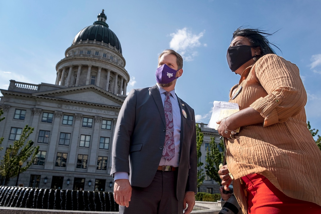 (Leah Hogsten  |  The Salt Lake Tribune) Rep. Sandra Hollins, D-Salt Lake City, who persuaded lawmakers to unanimously approve putting Amendment C on the ballot stands with Senate sponsor, Sen. Jake Andergg, R-Lehi, on the Capitol grounds on Tuesday.  A coalition of politicians, religious leaders and civil rights activists are urged Utahns to pass Amendment C on the ballot to remove old wording in the state constitution, Sept. 22, 2020, that they say still allows slavery as a punishment for crime.