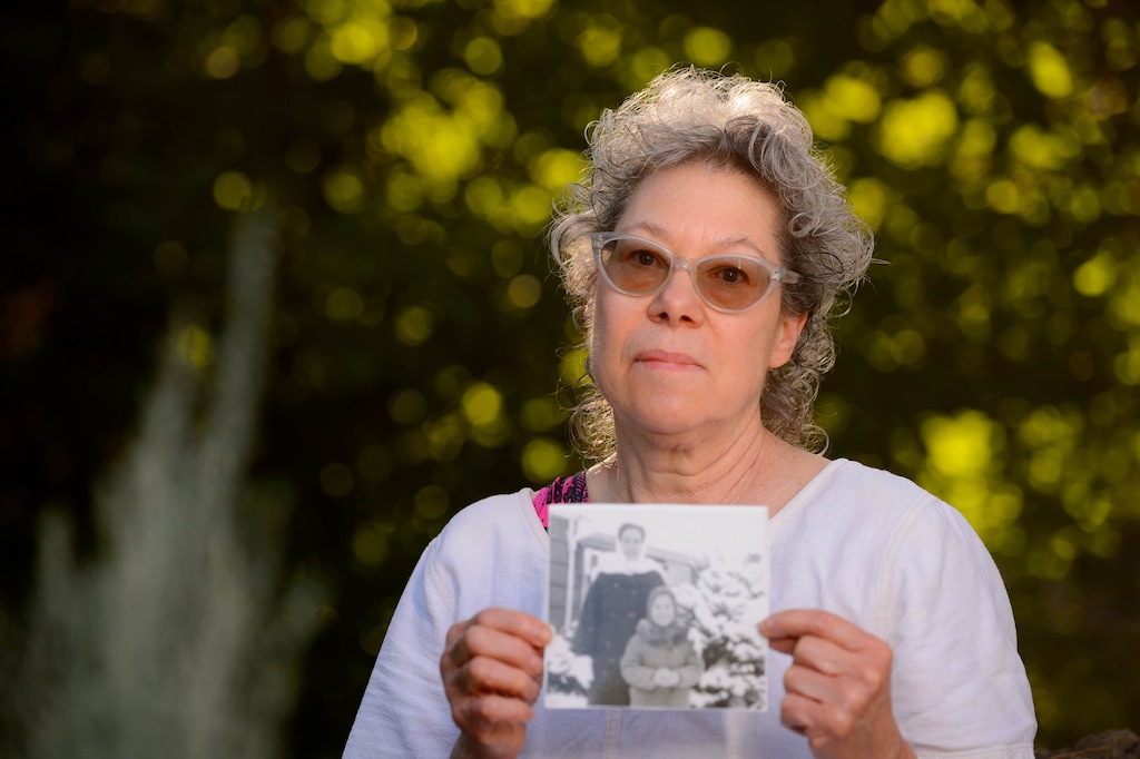 (Trent Nelson  |  The Salt Lake Tribune) Natasha Sajé holds a photo of her and her mother, Hiltrud Saje, who died of coronavirus on May 8. Sajé was photographed at her Millcreek home on Friday, July 10, 2020.