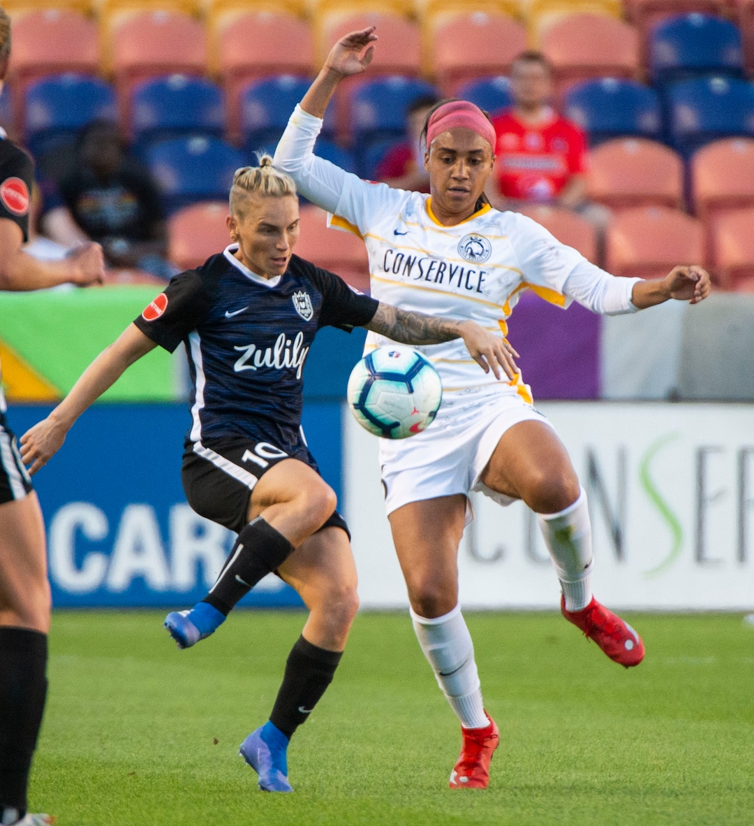 (Rick Egan  |  The Salt Lake Tribune)   Utah Royals FC defender Samantha Johnson (16) goes for the ball along with Seattle Reign FC midfielder Jessica Fishlock (10), in soccer action between Utah Royals FC and Seattle Reign FC in Sandy, Friday, June 28, 2019.