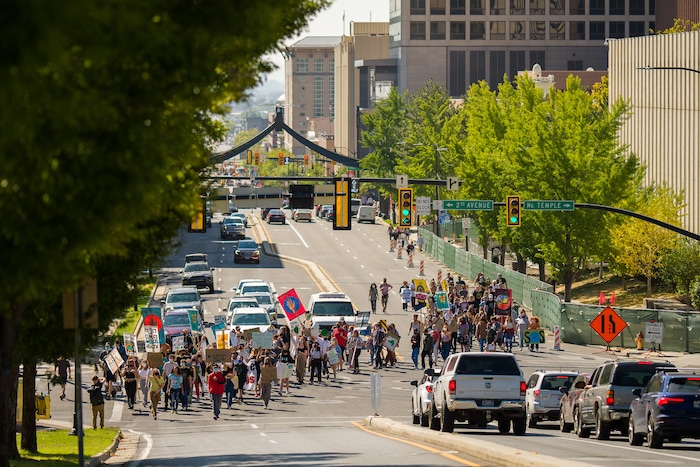 (Trent Nelson | The Salt Lake Tribune) Youth march to the State Capitol in Salt Lake City for Future Utah’s climate strike on Friday, Sept. 24, 2021..