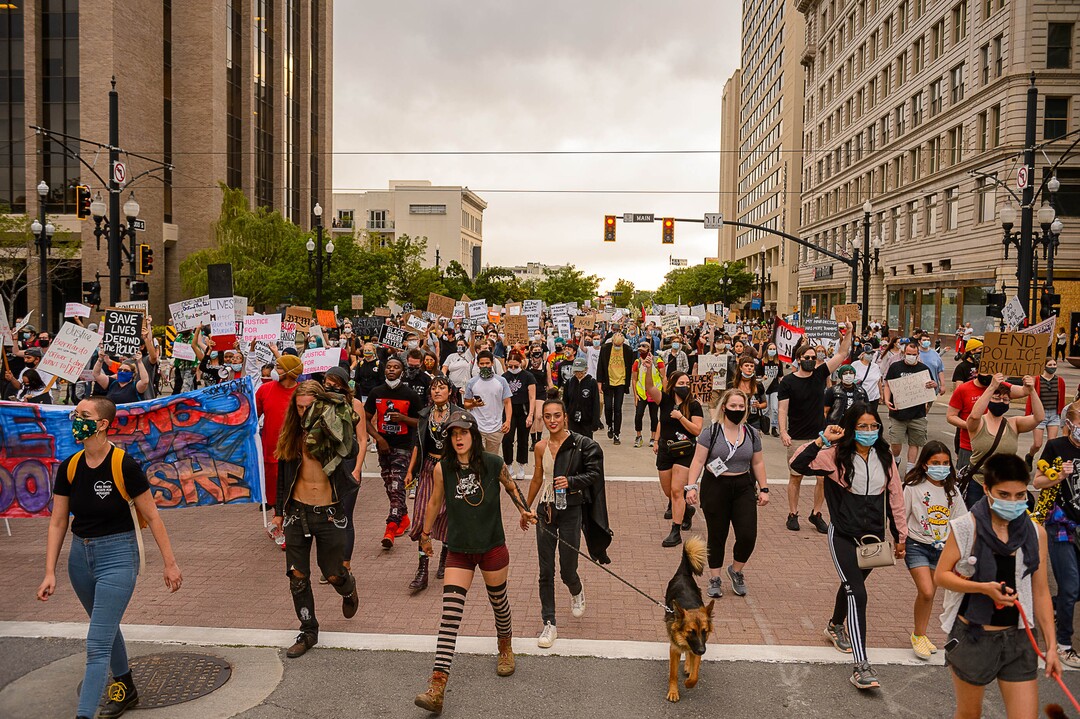(Trent Nelson  |  The Salt Lake Tribune) People march against police brutality in Salt Lake City on Saturday, June 13, 2020.