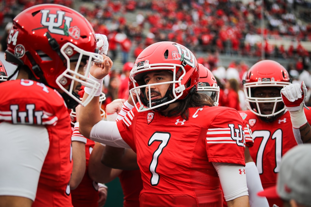 (Meg Oliphant | Special to The Tribune) Cameron Rising (7) of the Utah Utes talks with teammates ahead of warm ups before the game against the Penn State Nittany Lions at Rose Bowl Stadium on Jan. 2, 2023 in Pasadena, Calif.