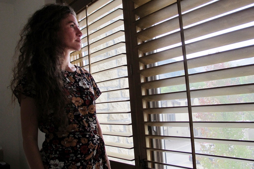 (Jason Dearen | AP Photo) Chelsea Goodrich poses for a portrait at a friend's house in Ketchum, Idaho, on Tuesday, Sept. 19, 2023. Goodrich's father, a popular Idaho dentist and former bishop in The Church of Jesus Christ of Latter-day Saints, was excommunicated after sharing details about his relationship with her when she was a child during a religious confession. Recordings obtained by The Associated Press show that instead of helping prosecutors, the church used a legal playbook that has helped protect itself from sex abuse claims. Goodrich's father is today a free man, and she says she decided to speak out to protect other children.