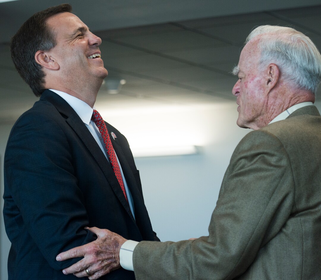 (Rick Egan  |  The Salt Lake Tribune)   University of Utah's new Athletic Direct, Mark Harlan, talks to Spence Eccles after a news conference at the Rice-Eccles Stadium,  Monday, June 4, 2018.