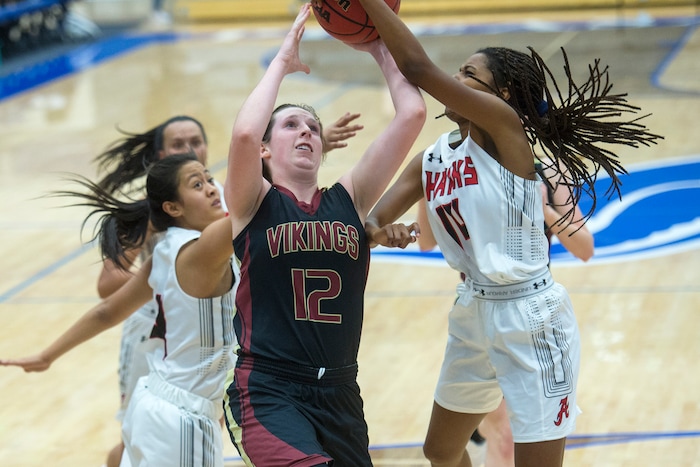 (Chris Detrick | The Salt Lake Tribune) Viewmont's Mercedes Staples (12) is fouled by Alta's Sydney Williams (14) during the game at Pleasant Grove High School Thursday, November 30, 2017. Viewmont defeated Alta 65-44.