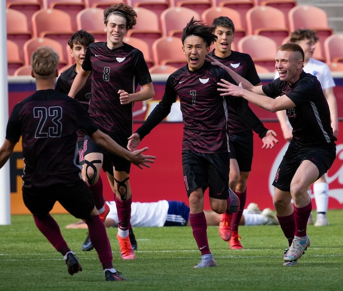 (Leah Hogsten | The Salt Lake Tribune) Layton Christian Academy's Felipe Harada (7) celebrates with teammates after scoring the team's first goal as Real Salt Lake Academy over Layton Christian Academy for the 3A State Soccer Championship title at Rio Tinto Stadium, Wednesday, May 11, 2022. Layton Christian Academy won the title 4-0. 