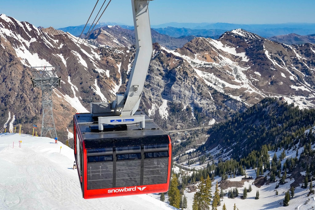 (Francisco Kjolseth | The Salt Lake Tribune) Snowbird's red tram carries skiers and snowboarders on the last day of the 2024-25 ski season on Monday, May 26, 2025.