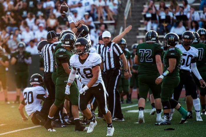 (Chris Detrick  |  The Salt Lake Tribune)    Highland's Colton White (18) celebrates a fumble recovery during the game at Hillcrest High School Friday, September 1, 2017. 